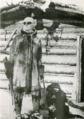 Kate Rice Prospector, Trapper, and Adventurer on Snow Shoes outside her cabin on Wekusko Lake