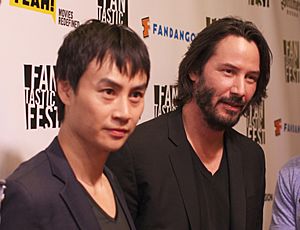 Keanu Reeves and Tiger Chen, red carpet for Man of Tai Chi (10614803564) (cropped)