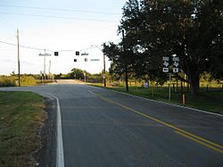 Looking southeast on FM 361 at its intersection with FM 1994