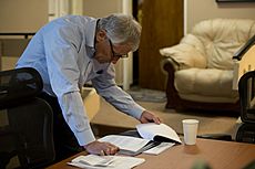Secretary of Defense, Chuck Hagel, starts his day reading newspaper excerpts in the Early Bird, in Kabul, Afghanistan