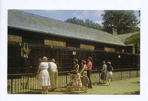 Staten Island Zoo (people at railing watching monkey in outdoor cage) (NYPL b15279351-105159)f