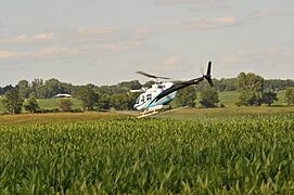 Helicopter crop dusting, Iowa 12