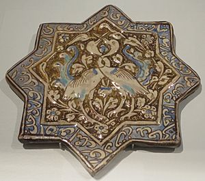 Lusterware star tile with entwined cranes, Iran (Kashan), Ilkhanid, 13th-14th century