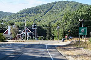 Intersection of NH 16 and NH 41 in West Ossipee. Nickerson Mountain, site of former Mt. Whittier Ski Area, rises in background.
