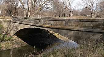 An image of an old concrete bridge