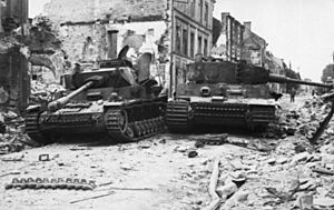 Bundesarchiv Bild 101I-494-3376-08A, Villers-Bocage, zerstörte Panzer IV und VI