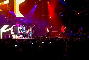 Mack Maine, Lil Wayne, Jae Millz, and Gudda Gudda performing at General Motors Place.jpg