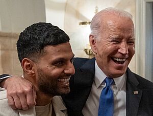 President Joe Biden with Jay Shetty, host of the podcast “On Purpose with Jay Shetty” on July 26, 2023, in the Center Hall of the White House (cropped) (cropped)