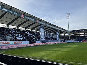 The Altach fans' stand with a tifo before a match against Sturm Graz. (2022)