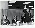 Three unidentified men, Kevin H. White (second from left) and Mayor John F. Collins (standing) (13242546035)