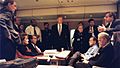 Bill Clinton and officials on Air Force One