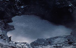 Dave Johnston collecting sample from Mount St. Helens crater lake, 30 April 1980 (USGS) cropped