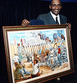 Ernie barnes with in remembrance painting