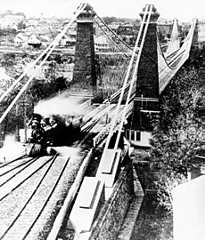 Locomotive Crossing the Suspension Bridge