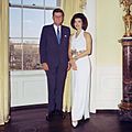 President and First Lady, Portrait Photograph. President Kennedy, Mrs. Kennedy. White House, Yellow Oval Room. - NARA - 194262 (cropped)