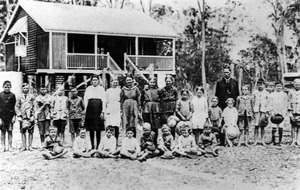 Pupils and teacher outside the Miriam Vale State School, 1918f