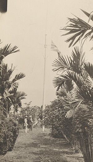Soldiers hoisting the Union Jack at Kieta, Bougainville, German New Guinea