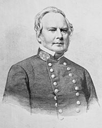 Black and white print shows a clean-shaven man wearing a gray double-breasted military uniform with three general's stars on the collar.