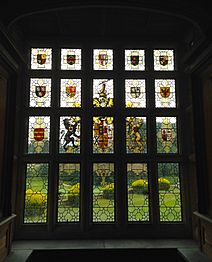 Window in the Cedar Library built by Sir Aston Webb, featuring the arms of Baron Llangattock