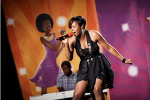 Yemi Alade performing on the maiden edition of Peak Talent Show in 2009