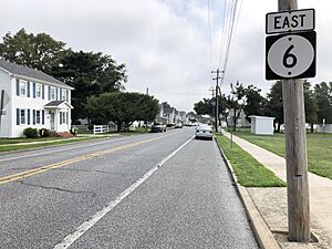2022-07-16 09 17 56 View east along Delaware State Route 6 (Main Street) at Hudson Street and School Lane in Clayton, Kent County, Delaware
