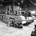 Auxiliary Territorial Service (ATS) women working on a Churchill tank at a Royal Army Ordnance Corps depot, 10 October 1942. H24517