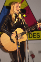 Jewel performs at Camp Bondsteel, Kosovo in December 2000