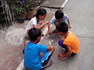 Kids playing pog