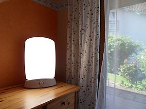 Light therapy lamp and sunlight
