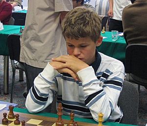 chess24 - Carlsen beats Topalov to take the sole lead in