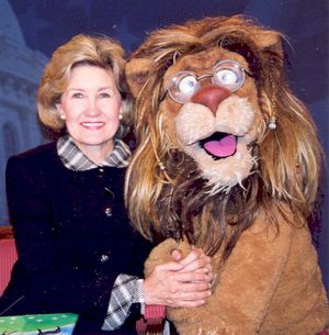 Kay Bailey Hutchison and Theo from the PBS show Between the Lions