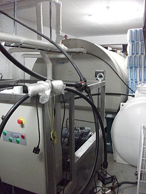 Pumpable ice maker and storage tank installed in a basement of Cyprus Olimpic supermarket