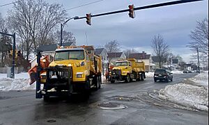 Albany County DPW vehicles assisting with snow removal in the aftermath of the December 2022 blizzard, Michigan Avenue, Buffalo, New York - 20221228