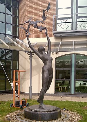 Girl with Doves (1973) David Wynne, Station Approach, Leatherhead, Surrey