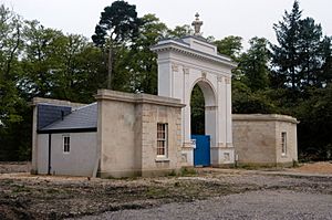London Lodge (1793), brick but Coade stone dressed, and wings (1840), Highclere Castle, Hampshire, May 2014