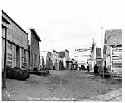 Main Street showing the Seaside Restaurant, Hotel Weston, Archer, Ewing & Co, Armstrong Hotel, The Union, and Palace Restaurant (NOWELL 199)
