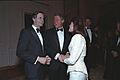 President Bill Clinton and First Lady Hillary Clinton greet guests at the National Governors Association Dinner in the Blue Room of the White House (18) (cropped)