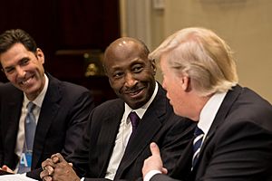 President Donald Trump listens to Kenneth Frazier, chairman and CEO of Merck & Co