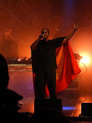 Ziggy Ramo performs at Adelaide Festival 2021 wearing a variation of the Australian aboriginal flag