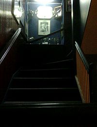 Britannia Yacht Club stairwell with Frank Amyot photo and trophies