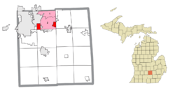 Location within Ingham County and portions of the administered CDPs of Haslett (1) and Okemos (2)