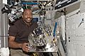 STS-129 ISS-21 Leland Melvin with the failed Urine Processor Assembly in the Destiny lab