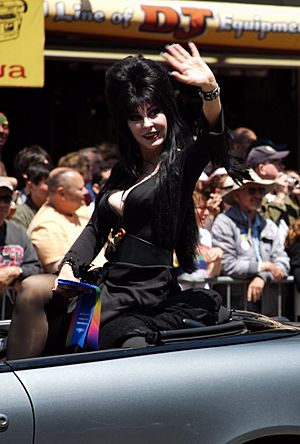 Elvira waving