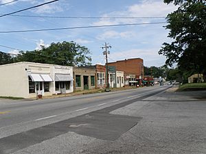 A part of Main Street looking East while standing in front of the courthouse.