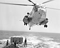 Sikorsky SH-3G Sea King of HC-1 refuels from USS Bagley (FF-1069) on 9 March 1981 (6395673)