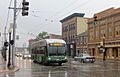 Dayton Gillig-Kiepe trolleybus 1404 westbound on 3rd St at Williams St in pouring rain (2018)