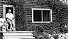 Ernest Lindner and wife Bodil on steps of cottage on Fairy Isle, Emma Lake August 1943.jpg