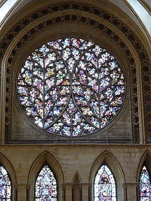 A very elaborate rose window with tracery forming a pattern like two ears of wheat.