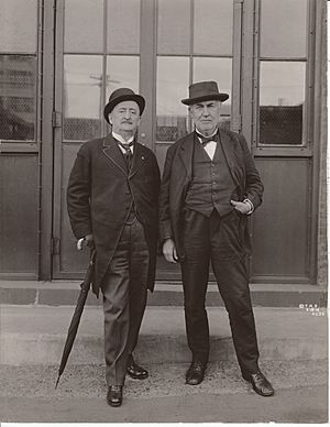 Mr. Francisco Madero Hernandez Sr. and Thomas Edison in front of the Building 5 entrance at Edison's West Orange Laboratory. (eea201b06e1b4f57af2a2a5121e86e2a)