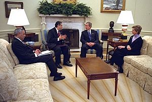 President George W. Bush meets with Colin Powell, Spencer Abraham, and Christine Todd Whitman